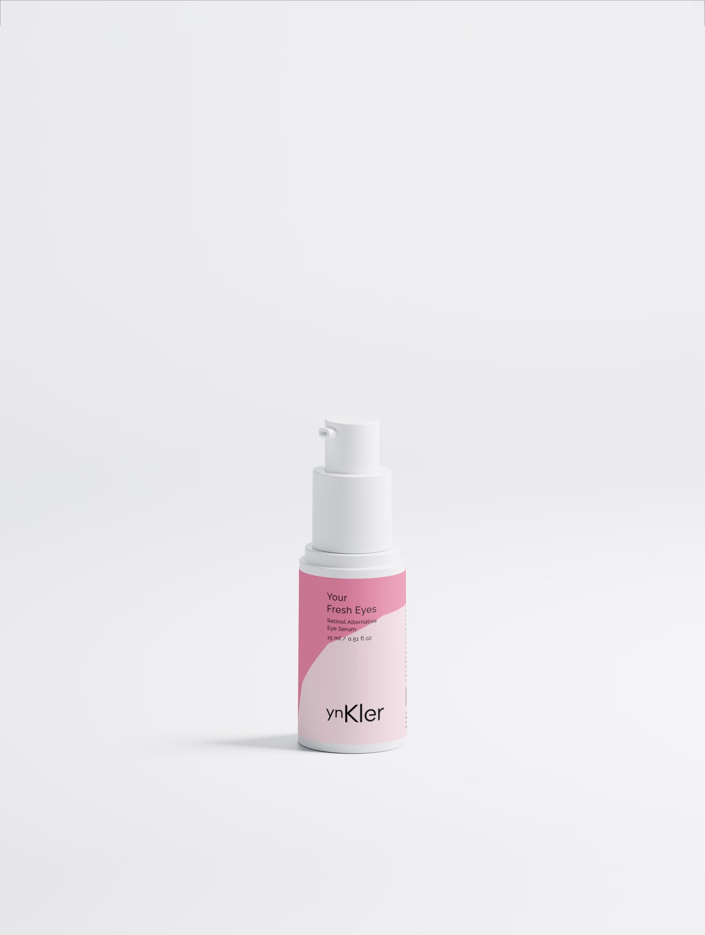 ynKler Skincare serum bottle with pink label on a white background