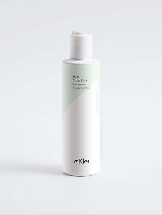 Skincare bottle labeled 'Your Prep Talk' by 'ynKler' on a light grey background